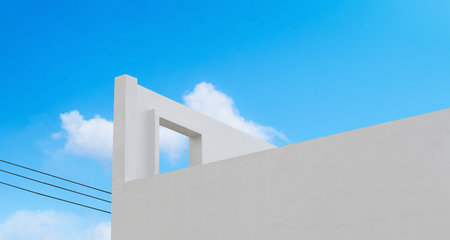Wall concrete texture with open window against blue sky and clouds, Horizon White paint cement building, Ant view Exterior Modern architecture with open door on roof in Spring or Summer sky, Minimal top buildingの写真素材