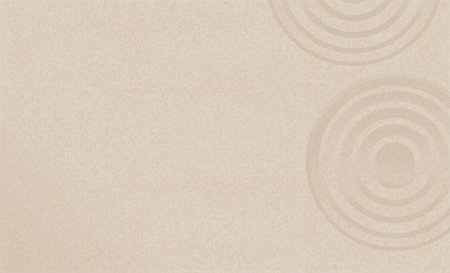 Sand beach texture with simple spiritual patterns in Japanese Zen Garden with concentric circles and parallel lines raked on smooth sandy surface background,Harmony,Meditation,Zen like conceptの写真素材