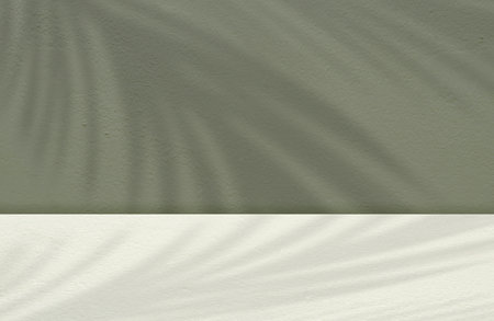 Concrete wall texture,Studio background with abstract coconut palm leaves shadow on green concrete wall background,Cement room background with leaves shadow overlay on rough surfaceの写真素材