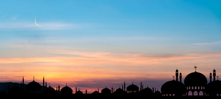Islamic card with Mosques dome,Crescent moon on Sunset sky,  Ramadan Night with twilight dusk sky for Islamic religion,Eid al-Adha,Eid Mubarak,Eid al fitr,Ramadan Kareem,Islamic new year Muharramの写真素材