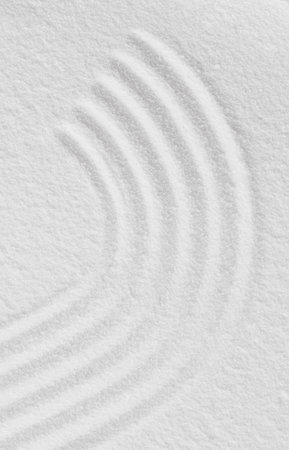 Zen garden with line pattern in white sand in Japanese style, Sand texture with the wave parallel...