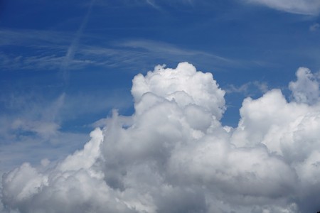 Amazing cumulus clouds on the blue sky background, GA USA.