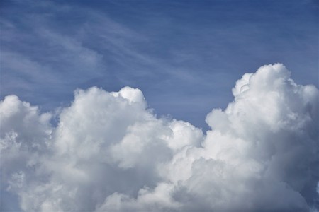 Amazing  cumulus clouds with clear blue sky on the background, Summer in GA USA.