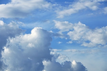 Amazing  cumulus clouds with clear blue sky on the background, Summer in GA USA.