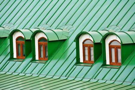 Roof dormers on the roof covered with green iron plates (the Kiev-Pecherskaya Lavra monastery, Kiev, Ukraine)の写真素材