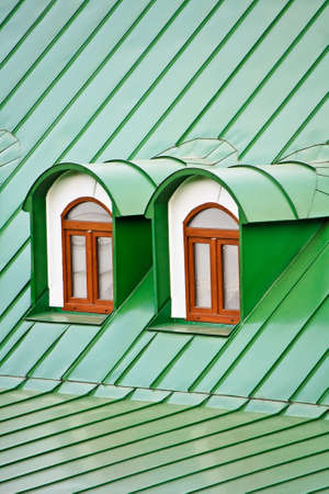 Roof dormers on the roof covered with green iron plates (the Kiev-Pecherskaya Lavra monastery, Kiev, Ukraine)の写真素材