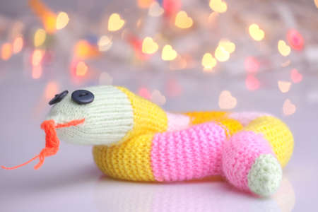 Happy cute knitted snake as 2013 New Year symbolの写真素材
