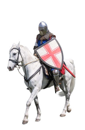 Armoured knight on white warhorse isolated on whiteの写真素材