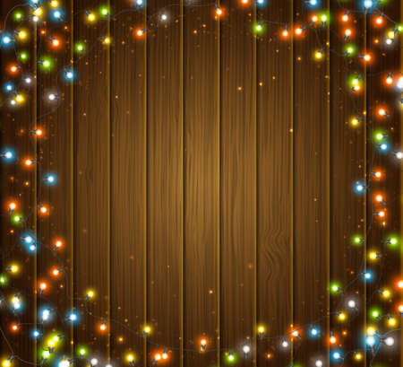 Fairy lights for festive decoration, realistic luminous bulbs. Colourful glowing Christmas round garland on wooden texture. Light effects for Christmas greeting cards, poster. Vector illustrationのイラスト素材