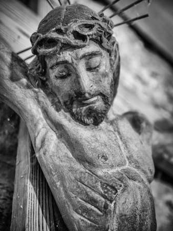 Black and white Christ statue of the Romanesque church of Erill la Vall in the Catalan Pyrenees, Spainの写真素材