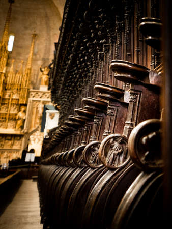 Carved wooden chairs of the cloister of the Cathedral of Tarragona, Catalonia, Spainの写真素材