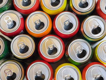 Recycling aluminum or metal empty cans top view. Group of cans for reuse and recycle.