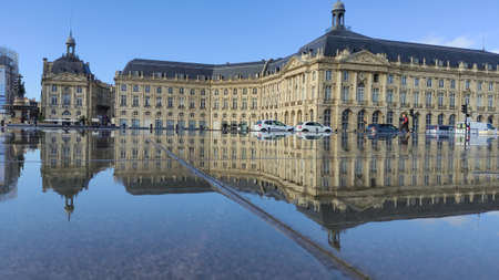 BORDEAUX, FRANCE - NOVEMBER 20, 2021: The mirror of the quay in front of the Place Royale (Place Bourse). This water mirror, making it the largest water mirror in the world.のeditorial素材