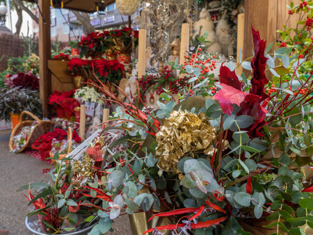 A lot of plants and Christmas decorations on the market. Traditional decoration for Christmas. selective focus natural lightの写真素材