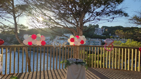 Wedding preparation on a beach in Tarragona, Spain, on a background of beautiful sea at sunset. Concept in love.の写真素材