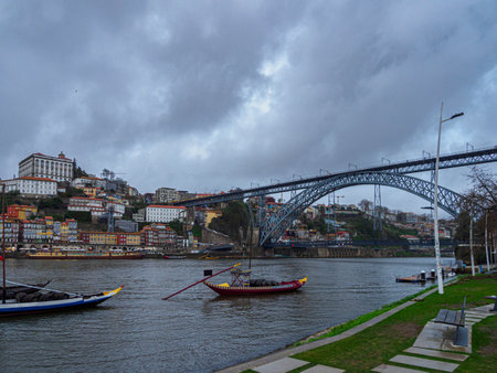 Large evening panoramic view of the bay of Porto and the Don Luis I Bridge, Portugal, symbol of the city.の写真素材