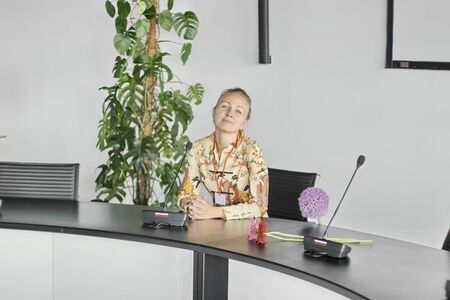 Business young girl in a modern office