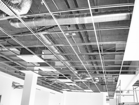 Works building finishing ceiling inside office premisesの写真素材