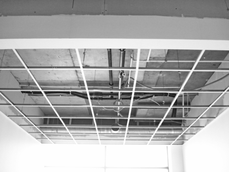 Works building finishing ceiling inside office premisesの写真素材