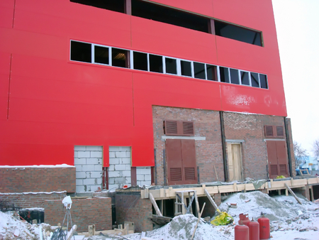 Construction Red Industrial Building in winterの写真素材