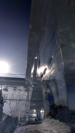 Icy Sculpture Building a sunny winter day