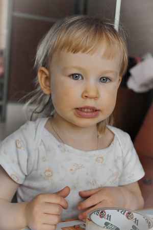 Little cute girl portrait day at homeのeditorial素材