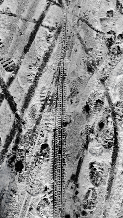 Texture Snow on Asphalt melts traces pavement