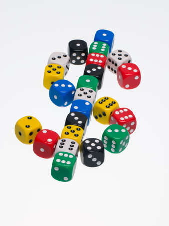 Dice in shape of a US dolar symbol illustrating risk in business and financeの写真素材