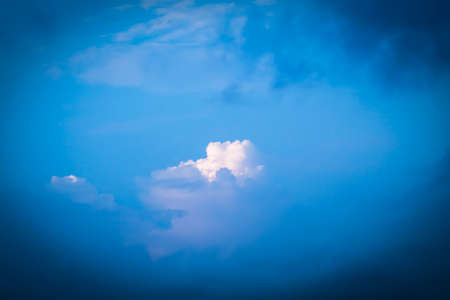 Soft white clouds against blue sky backgroundの写真素材