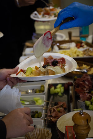 Snacks that are served on a plate by a provider.の写真素材