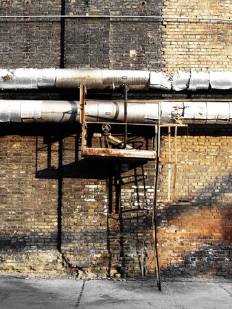 Rusty ladder at industrial areaの写真素材