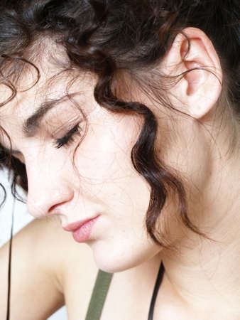 Face of a beautiful young woman dreamingの写真素材