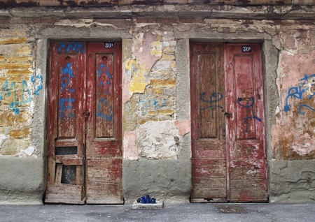 Doors of an abandoned houseの写真素材