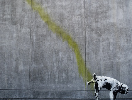 LOS ANGELES, USA - OCTOBER 17: Original Banksy grafitti on a wall (Pissing dog). Los Angeles, October 17, 2011.のeditorial素材