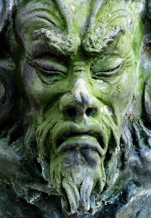 Face sculpture of a scary man