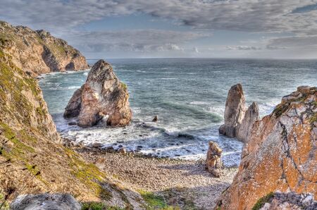 Rock cliffs by the sea  Cabo da Roca, Portugal の写真素材