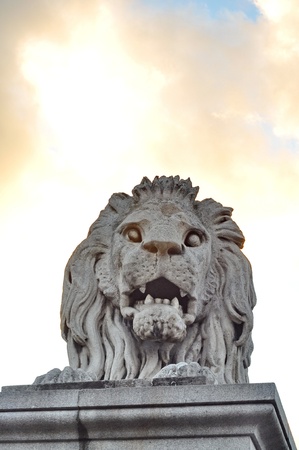 Guardian lion of the famous Chain Bridge of Budapestの写真素材