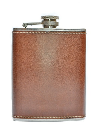 Brown hip flask isolated on whiteの写真素材