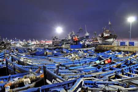 Blue fishing boats of Essaouira at nightの写真素材
