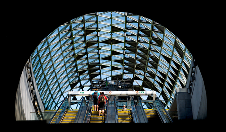 BUDAPEST, HUNGARY - AUGUST 17: Passengers passing by on the escalator  in Budapest, Hungary onAugust...