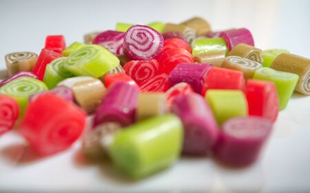Colorful candies on white backgroundの写真素材