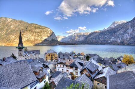 Beautiful village of Hallstatt  on the side of a lake in the Alps in Austriaの写真素材