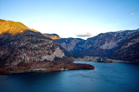 Beautiful village of Hallstatt  on the side of a lake in the Alps in Austriaの写真素材