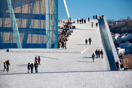 OSLO - MARCH 21: People hanging around in Opera house in Osloのeditorial素材