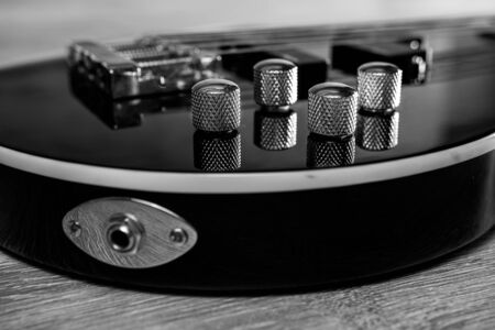 Body of a classic black bass guitarの写真素材