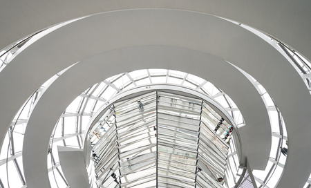 BERLIN, GERMANY - OCTOBER 21, 2017: People walking inside the Reichstag Dome. It is a glass dome constructed on the top of the Reichstag (Bundestag) building, designed by architect Norman Fosterのeditorial素材