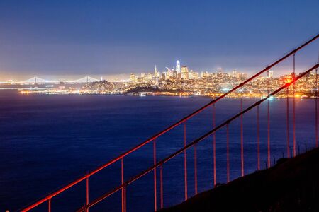 San Francisco Golden Gate Bridge and City Skyline Over the Bay at Blue Hourの写真素材