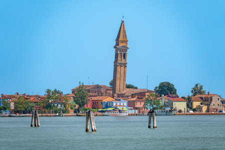 View of the Leaning Bell Tower of the Church of San Martino in Burano Island - Venice Italyの写真素材