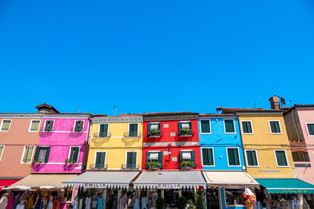 Colorful houses in a canal street houses of Burano island, Venice, Italyの写真素材