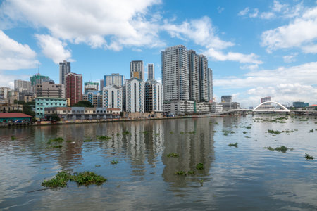 Skyline of manila by Pasig River in philippines